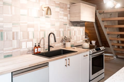 Sleek, modern appliances complement our whimsical, forest theme!