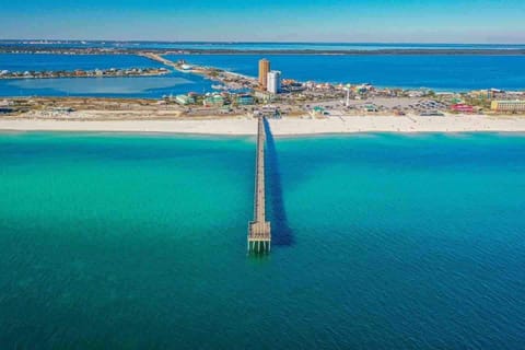 Located in the “Heart of Pensacola Beach” just across the street from the pier