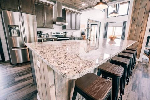 Our fully stocked "open" kitchen has everything you'll ever need for a relaxing vacation.  6 seats! 