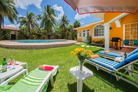 Private outdoor pool with chairs