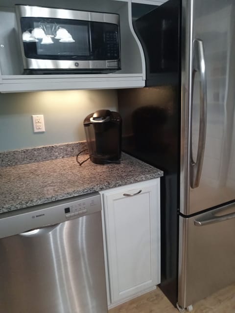 Modern, large kitchen with all cooking and baking-ware