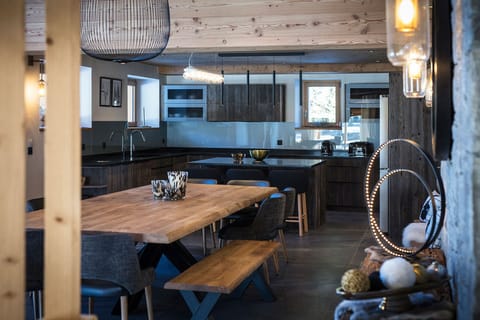 Dining room with opened kitchen and living room