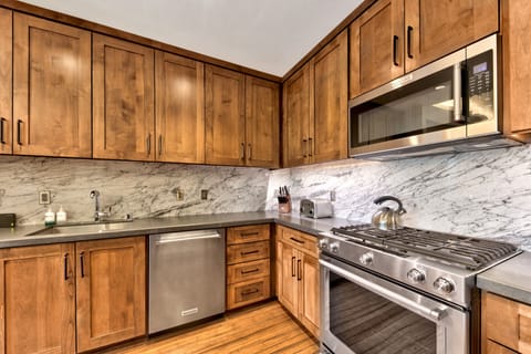 12 - Numerous small appliances - toaster, Cuisinart coffee maker, and microwave.