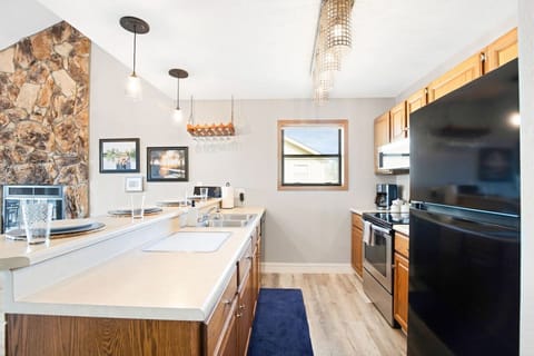 Fully equipped kitchen with modern amenities and a beautiful layout.