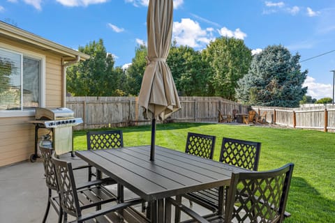Hang out on the back porch while the kids play and dog play in the back yard.
