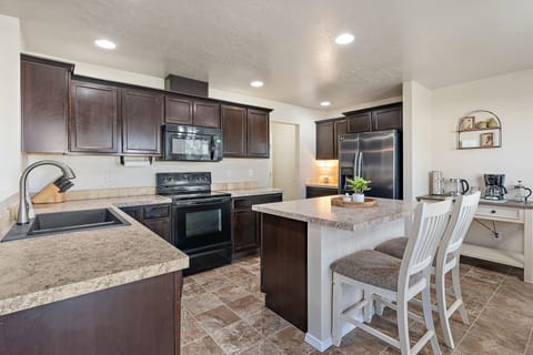 Kitchen ready for large home cooked meals. Stocked with everything you need.