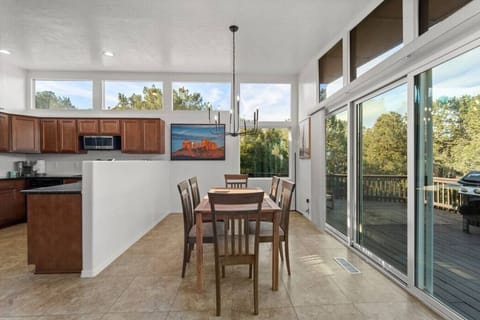 The open concept floor plan connects the dining room with the kitchen