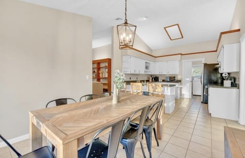 The dining room table has 8 seats, a bench that seats 3 behind it! 