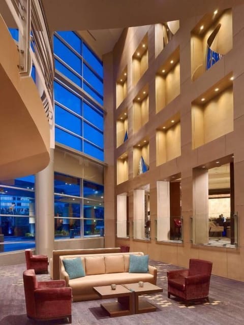 Gather and relax in the bright atrium lounge seating.