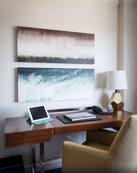 Plan your day at the spacious desk with warm lighting.