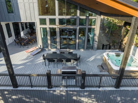 Whether you're dining, grilling, playing, or simply relaxing, the deck offers it all