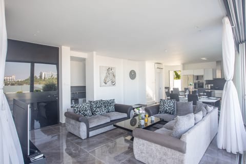 Living room with comfortable seating area and Smart TV