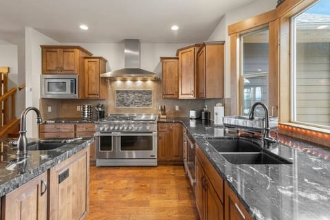 Fully appointed kitchen with 48" gas range