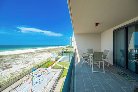 Enjoy meals or drinks on the balcony while taking in the beautiful views of the beach and gulf beyond