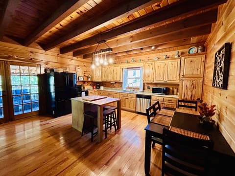 Another view of the kitchen and dining area. 