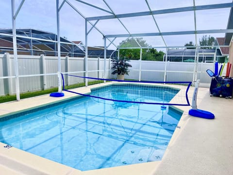 Large pool with volley ball and pool toys