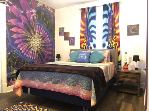 Bedroom with queen bed.