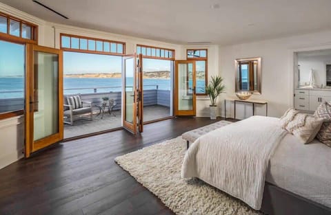 Luxurious oceanfront top-floor suite with private balcony, stunning views, fireplace, and en suite bath with tub and shower. Primary guests enjoy exclusive access to the entire floor via private elevator, offering the ultimate in privacy and comfort.