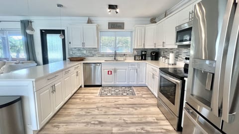 Large open kitchen fully stocked with everything needed for preparing a feast!