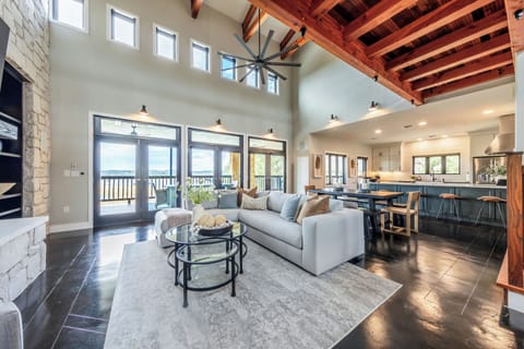 Living/Dining/Kitchen area with of windows/doors opening to a 930sf patio