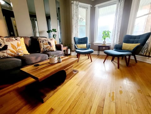 Bright, open living room with ample seating for you and your guests!