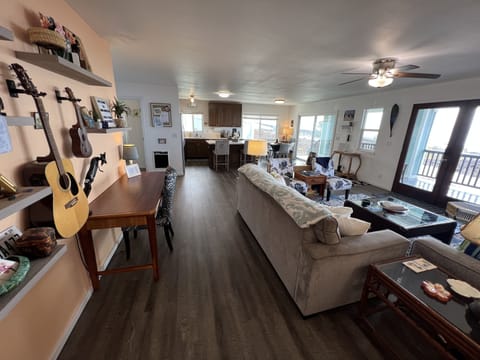 living room view from primary bedroom doorway