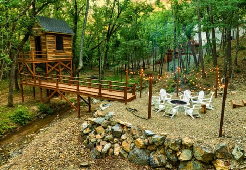 This charming treehouse in the woods adds a touch of magic to your stay, offering a fun and adventurous spot for all ages.