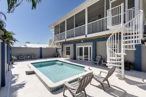 Newly refinished and repaved pool area with heated pool