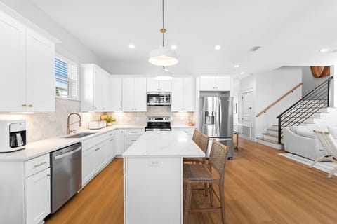 The extensive kitchen island adds additional seating.