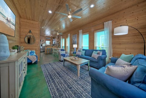 Elevate your living with wooden ceilings and spacious vibes.