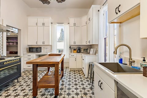 Fully stocked gourmet kitchen with gas range