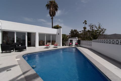 View of villa and private heated pool