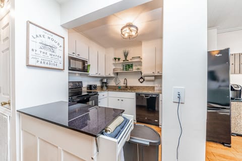 Extra counter space in kitchen and phone charging station