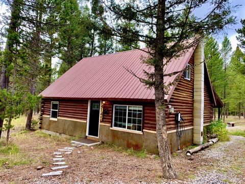 Front of cabin with EV charger.