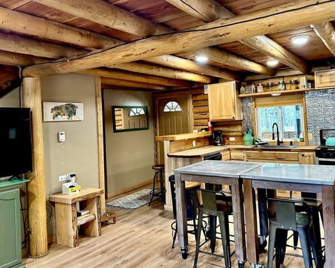 Enter the property through the back door into the kitchen.