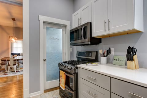 Fully stocked kitchen, with Gas stove, dishwasher, large fridge, and pantry.