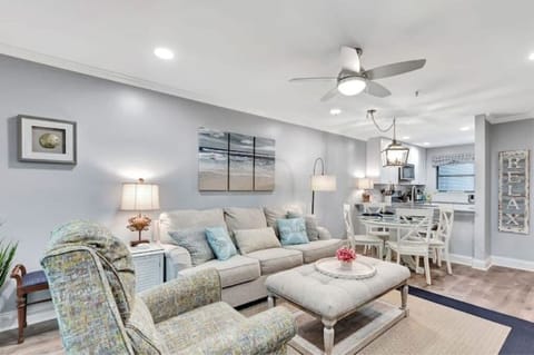 Cozy and stylish living and dining areas with a 65" smart tv!