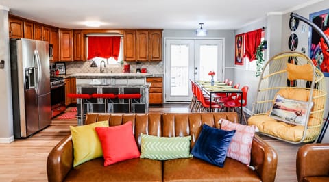 Family Time Headquarters – Create cherished memories in our living room, complete with comfy couches and a TV for movie nights.