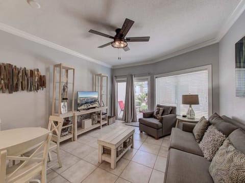 Spacious open concept living area looking out towards the patio.