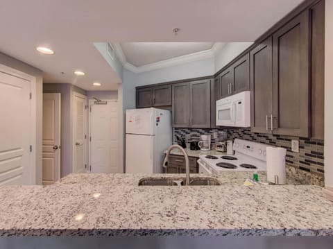 Kitchen area facing the front door.