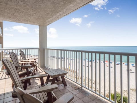 Relax on your private balcony with beautiful beach views