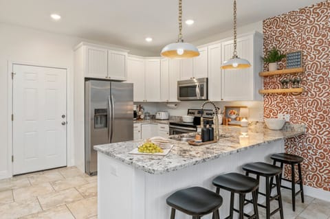 When you want to stay in, this fully-equipped kitchen will make it easy. 