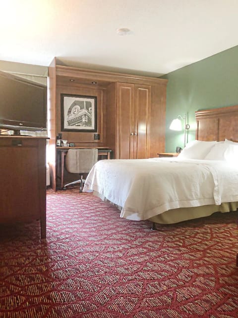 Lounge comfortably with a dedicated work nook and soft lighting.