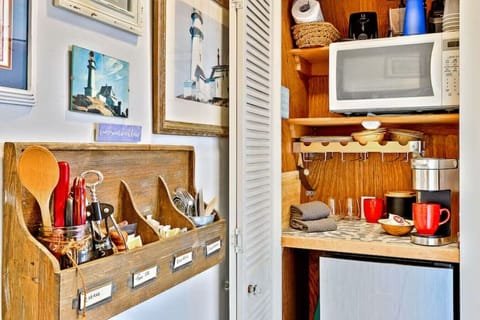 The kitchenette also has `starter supplies` with eco-friendly plates and cups.