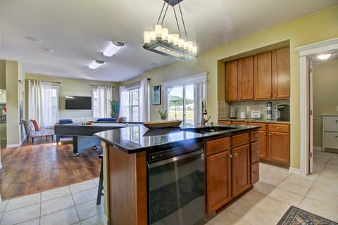 Experience culinary convenience in our fully equipped kitchen with a stylish and functional kitchen island.