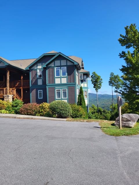 Our building with beautiful layered mountain views from the porch