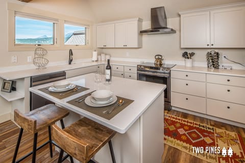 Updated Kitchen and Island with Bar Seating