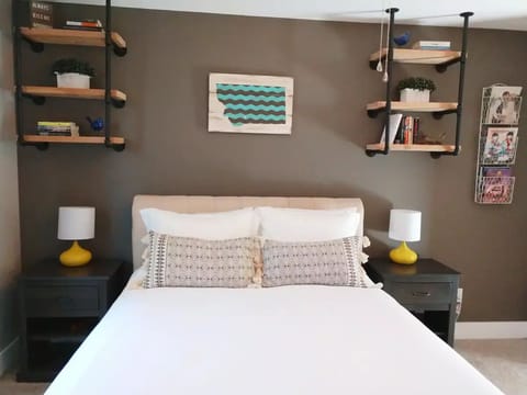 Kick back and relax in this cozy primary suite with a queen bed to sleep two