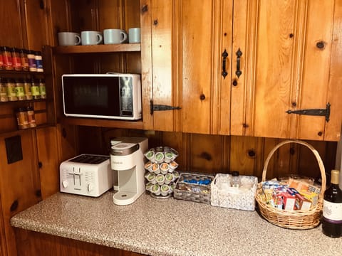 Toaster, microwave, Keurig coffeemaker, coffees, teas, snacks, and more!