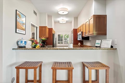 Bar seating open to the kitchen